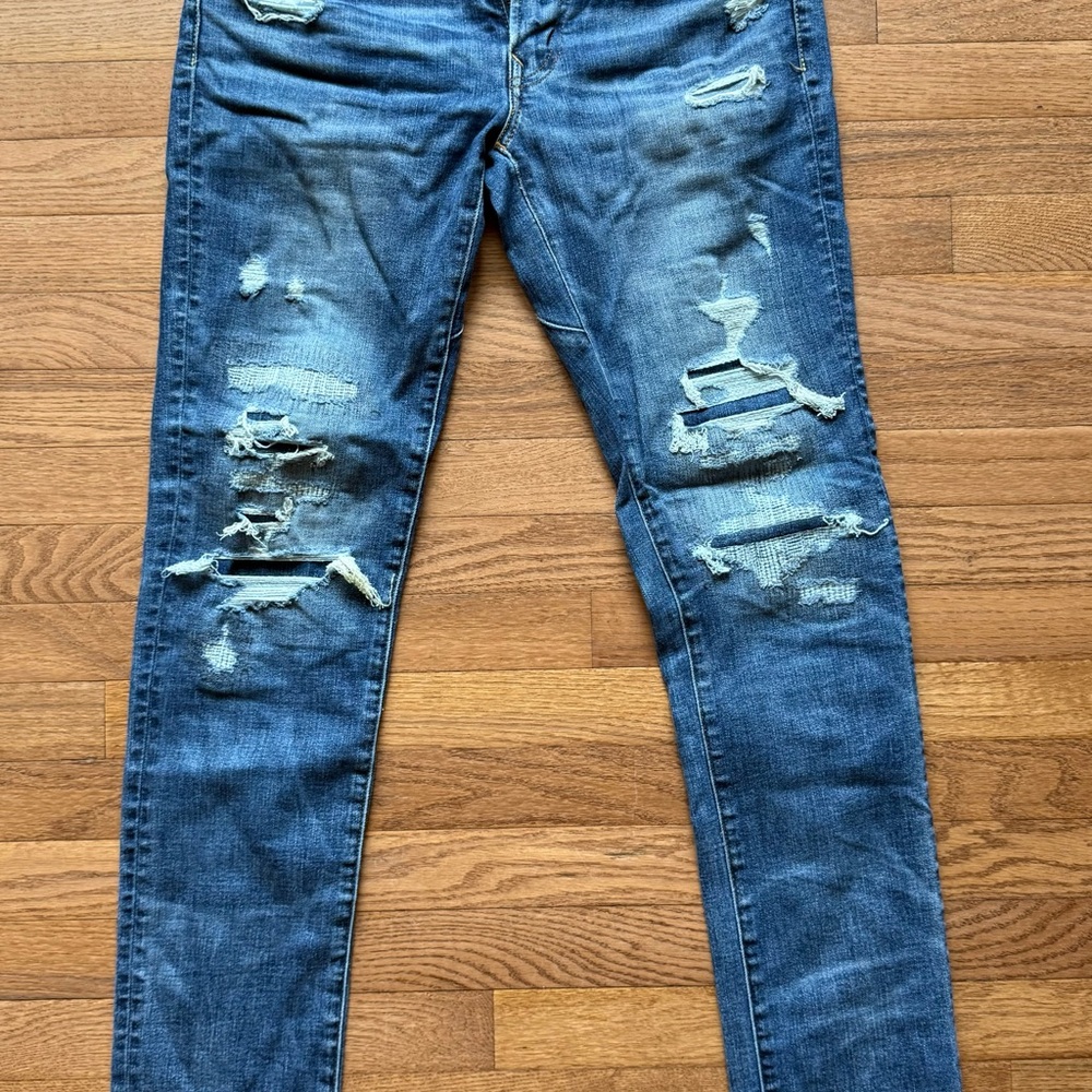 Distressed Blue Jeans